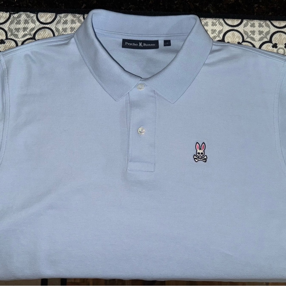 Psycho Bunny Polo

23” armpit to armpit 
32” top of collar to waist

8 is an XXL